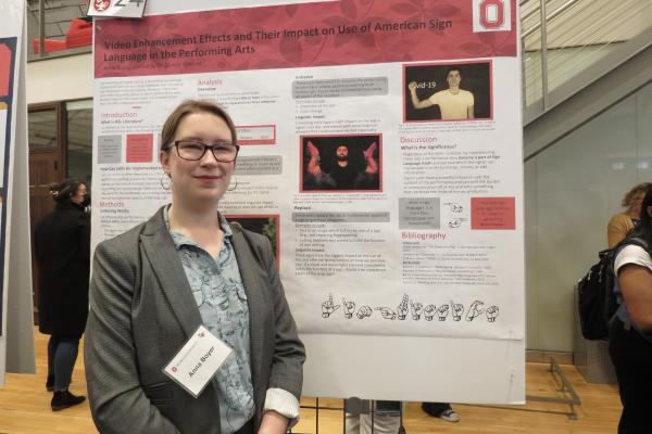 Anna Boyer with her poster at the Denman