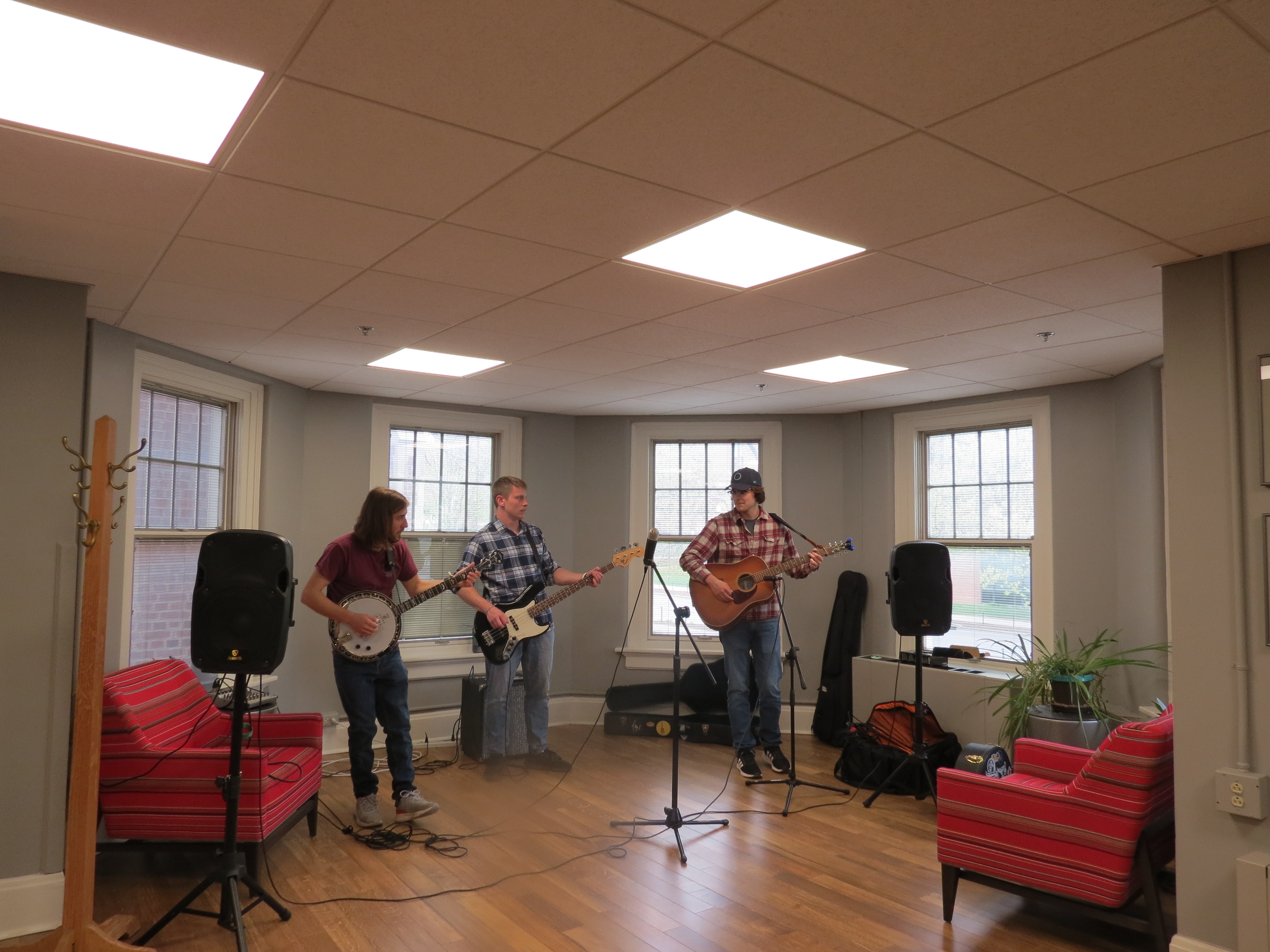 Linguistics student Simon Grome performs with his band at the end-of-year party