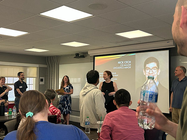 Martha Johnson receiving the teaching award at the event