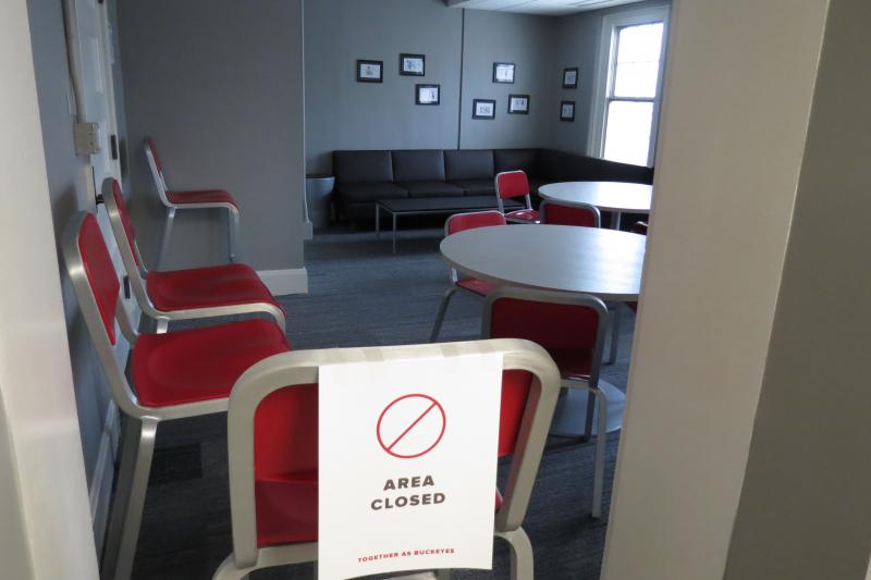 The Oxley lounge, with a chair blocking it off marked with an "area closed" sign.
