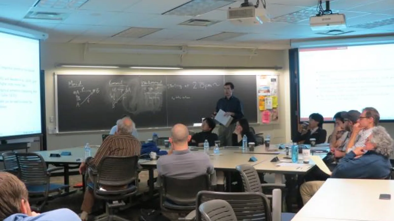 Faculty members in a lecture