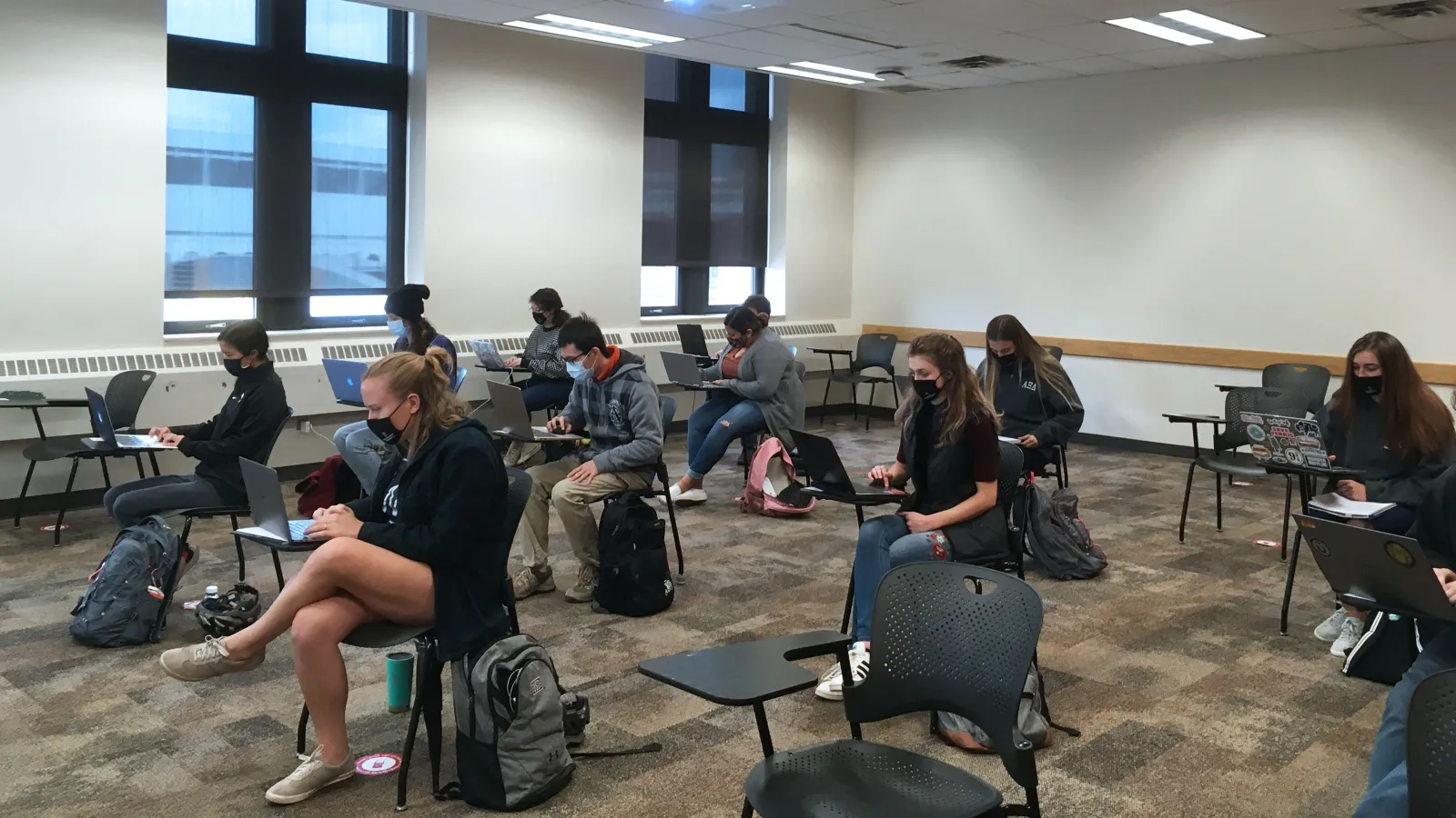 Students socially-distancing in a linguistics class