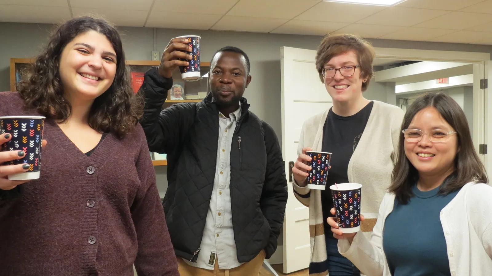 Students enjoying cocoa at the end-of-semester event