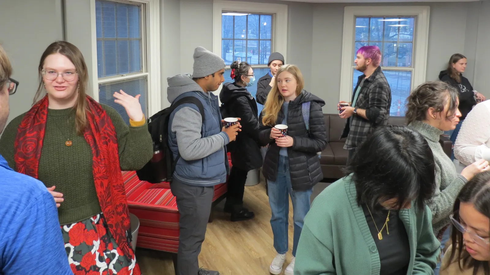 Students having cocoa at the reception
