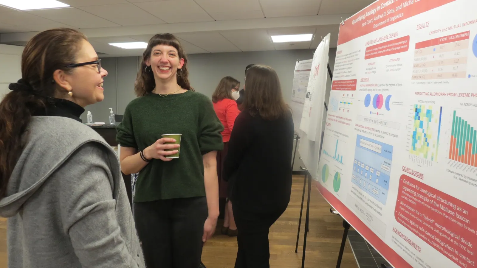 Grad student Sara Court presenting a poster