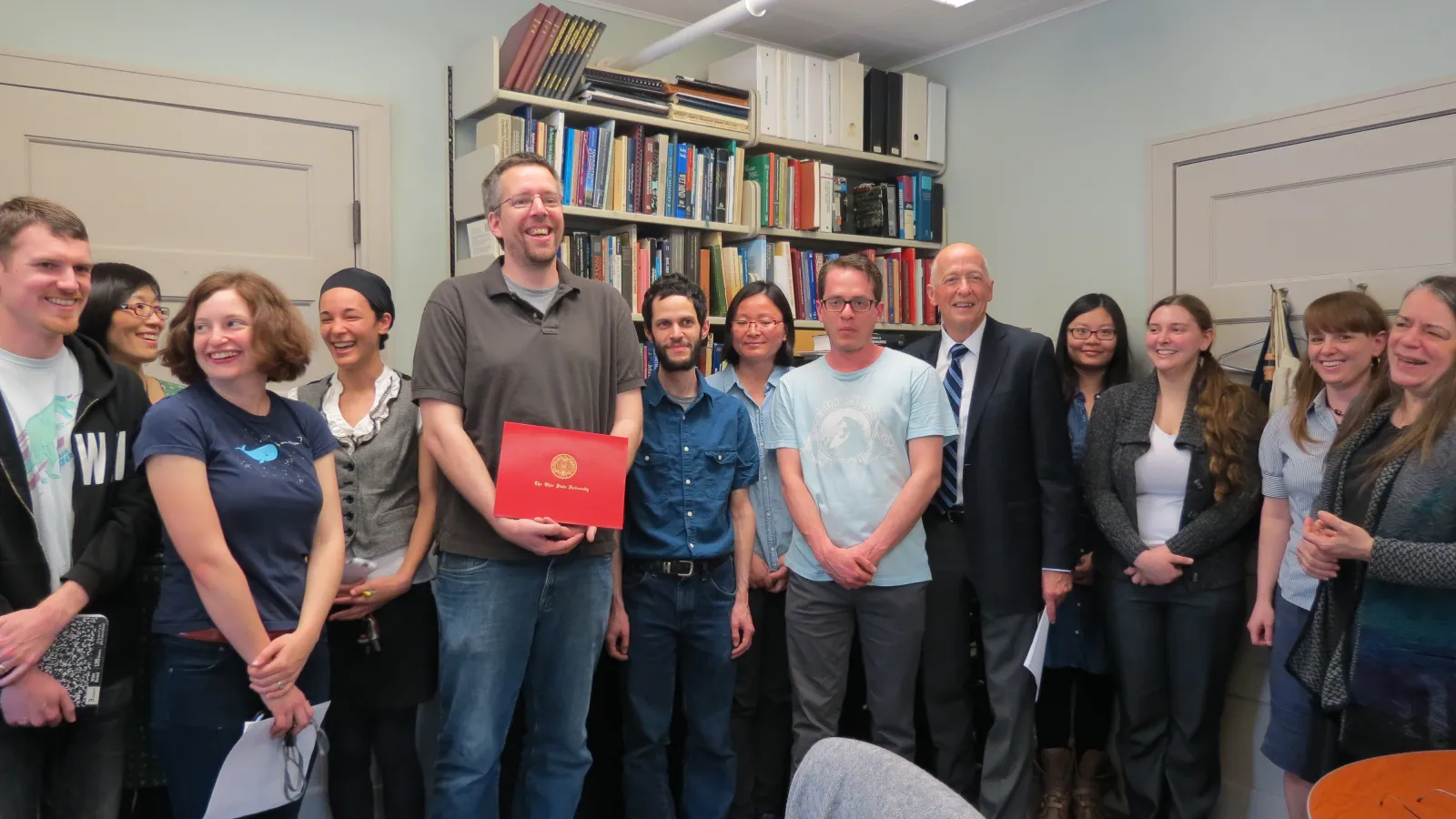 Dean Osmer visited the department to present Mike Phelan with his award