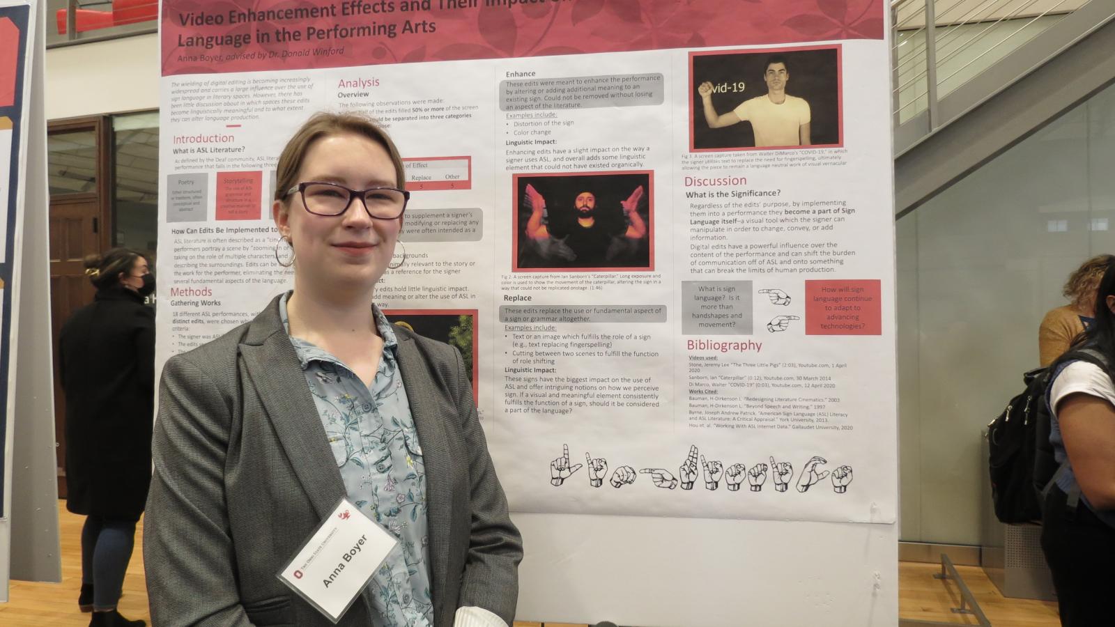 Anna Boyer with her poster at the Denman
