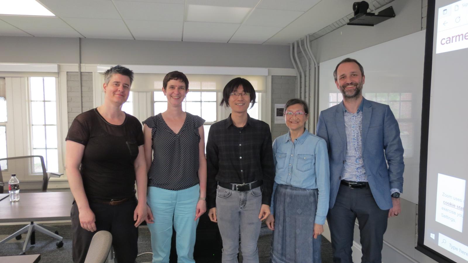 Yuhong Zhu with his committee (Becca Morley, Cynthia Clopper, Marjorie Chan, and advisor Bjoern Koehnlein) after his successful defense