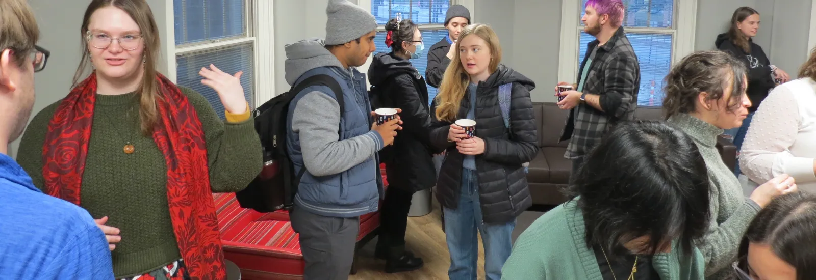 Students having cocoa at the reception